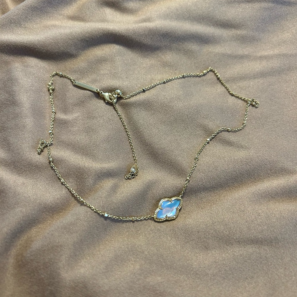 Elegant Gold and Iridescent Clover Necklace